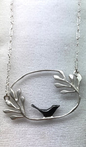 Bird in oval garden necklace
